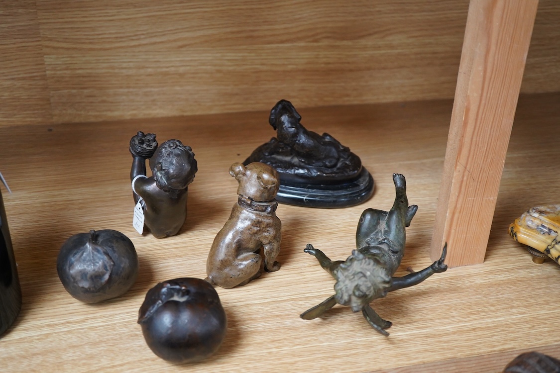 A small bronze of a of a hound and puppies after Louis Theophile Hingre (1832-1911), on marble base- 14.5cm wide, a painted bulldog ink stand, a putti and a fairy and two models of apples. (6).